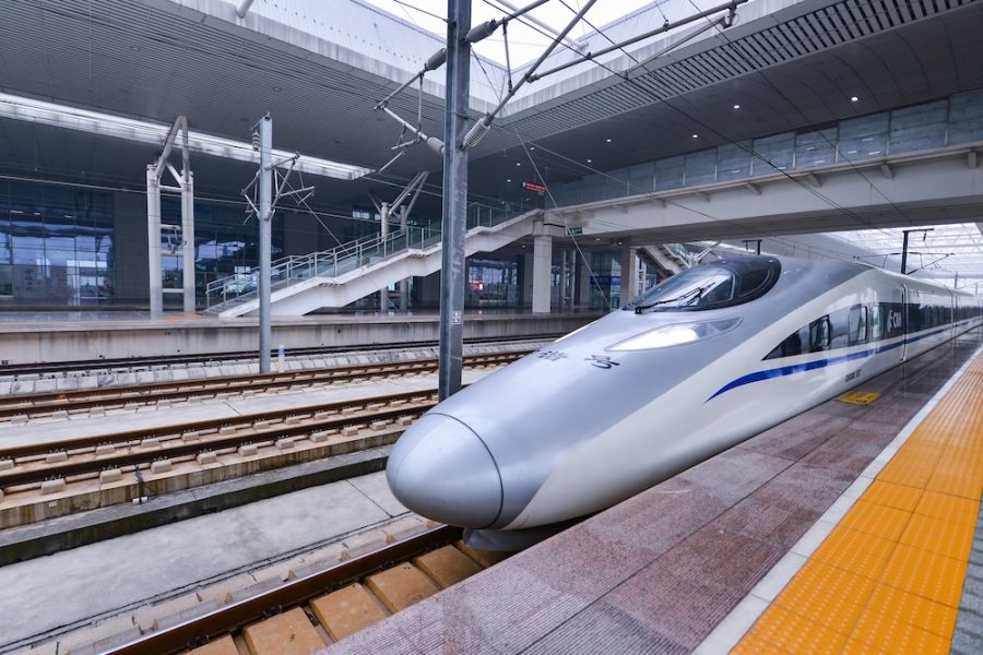 XIAN - OCT 24: Bullet train at Xian Railway Station on October 24, 2015 in Shannxi, Xian. China has the world's longest high-speed rail network with 9,676 km (6,012 mi) of routes in service.
