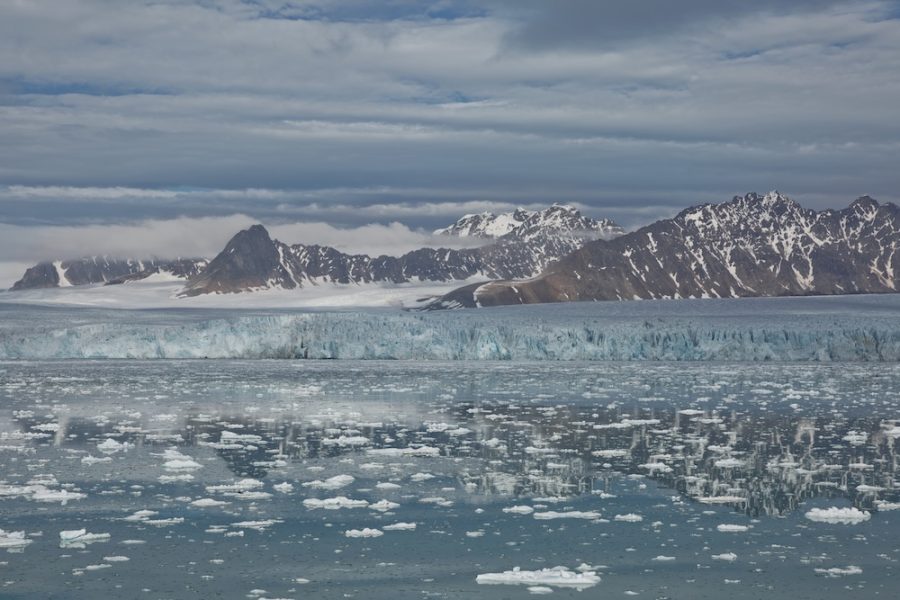 Mountains, glaciers and coastline landscape close to a village called "Ny-Ålesund" located at 79 degree North on Spitsbergen.